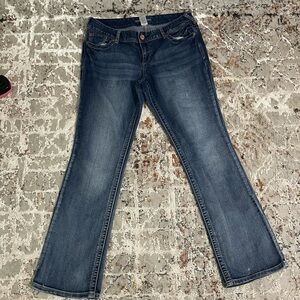 Maurices Dark wash boot cut jeans Embroidery on back pockets.